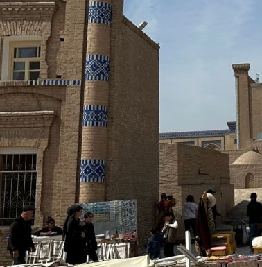 Corner of the Russian School showing the minaret-like detail and decorative tiles.