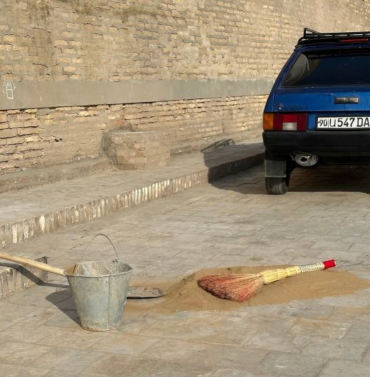 The town is sand-colored and there's plenty of loose sand to sweep away.