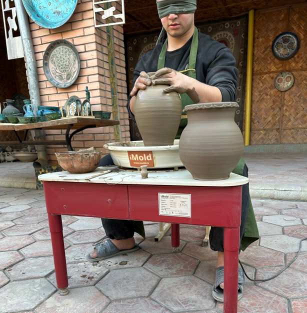 Becoming a master potter requires blindfolded work