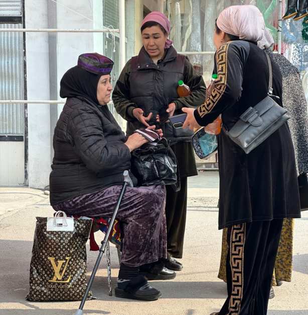 She makes men's hats and wears one as a sample