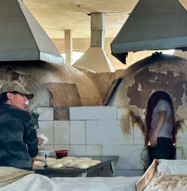 Bread going in the oven.