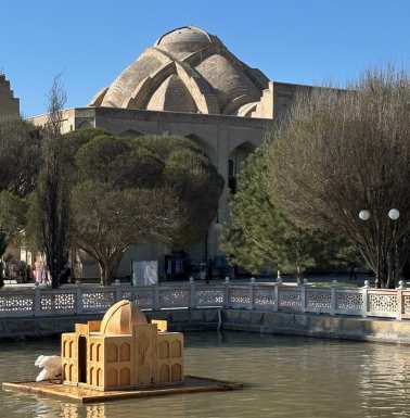 Khoja Bakhouddin Naqshbandi memorial complex - the 18th century pool with the khanaka dome rising above it.